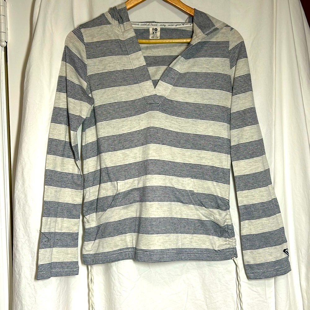Roxy long sleeve hooded shirt with front pocket and side cinches